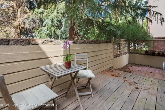 a view of a terrace with seating area