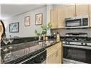 a kitchen with a stove and a microwave