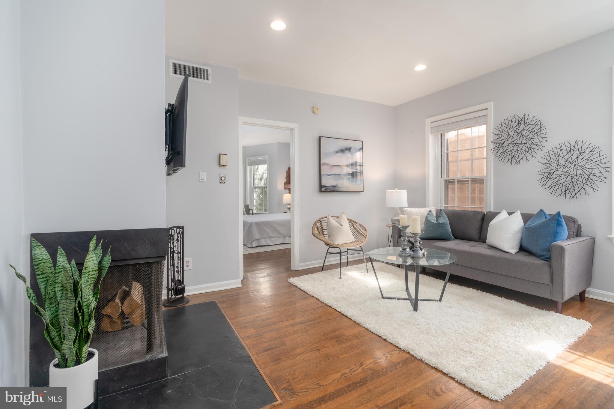 Living Room with Wood Burning Fireplace