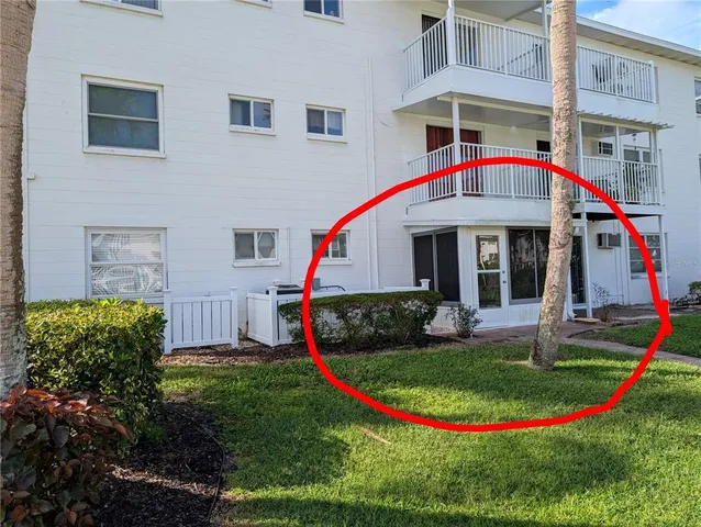 a view of a swimming pool with a lounge chairs