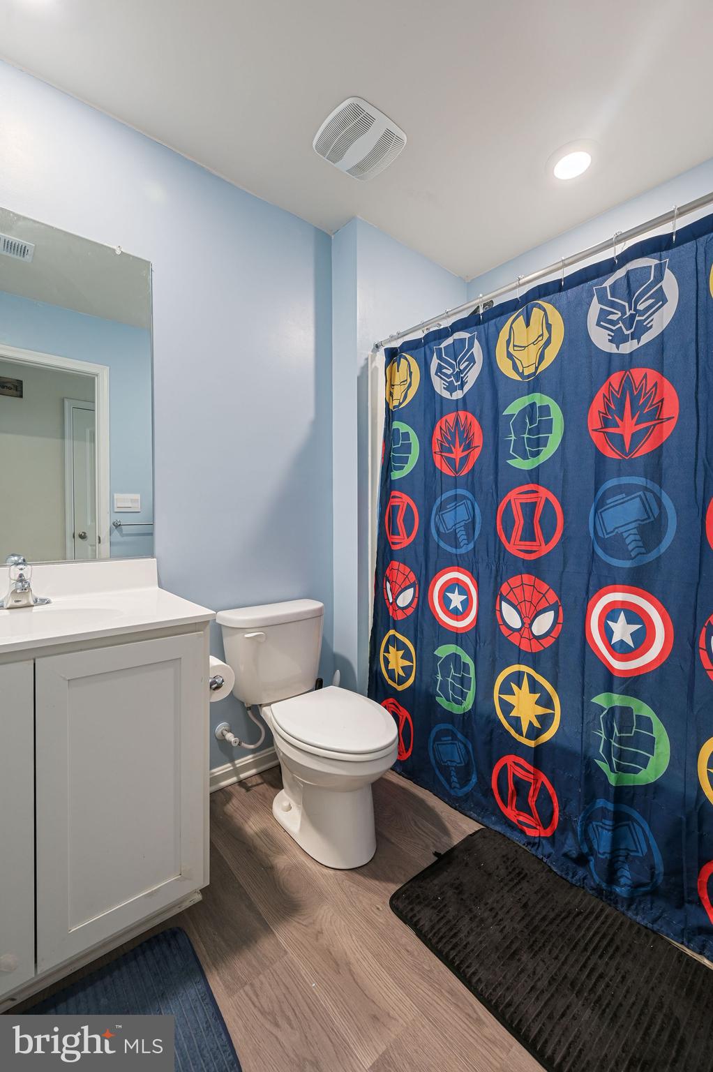 504 Currant Circle Magnolia, DE 19962 - Photo 17 of 27 a bathroom with a toilet sink and mirror