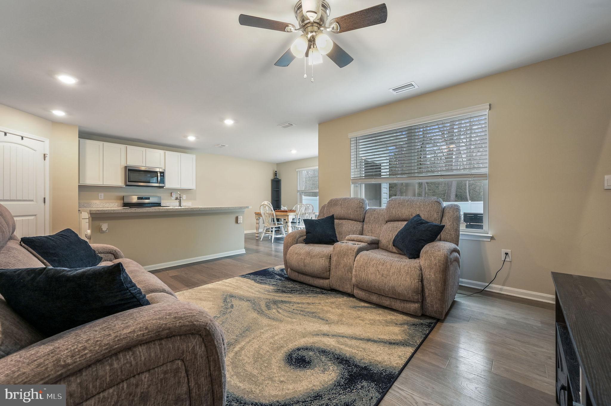 504 Currant Circle Magnolia, DE 19962 - Photo 3 of 27 a living room with furniture and a large window