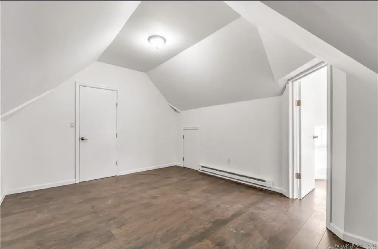 74 Carleton Avenue Bridgeport, CT 06604 - Photo 11 of 15 an empty room with a natural light