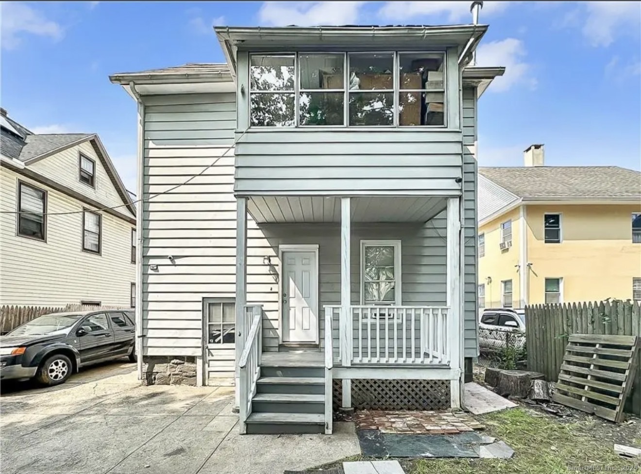 74 Carleton Avenue Bridgeport, CT 06604 - Photo 15 of 15 a view of a house with a door and a porch