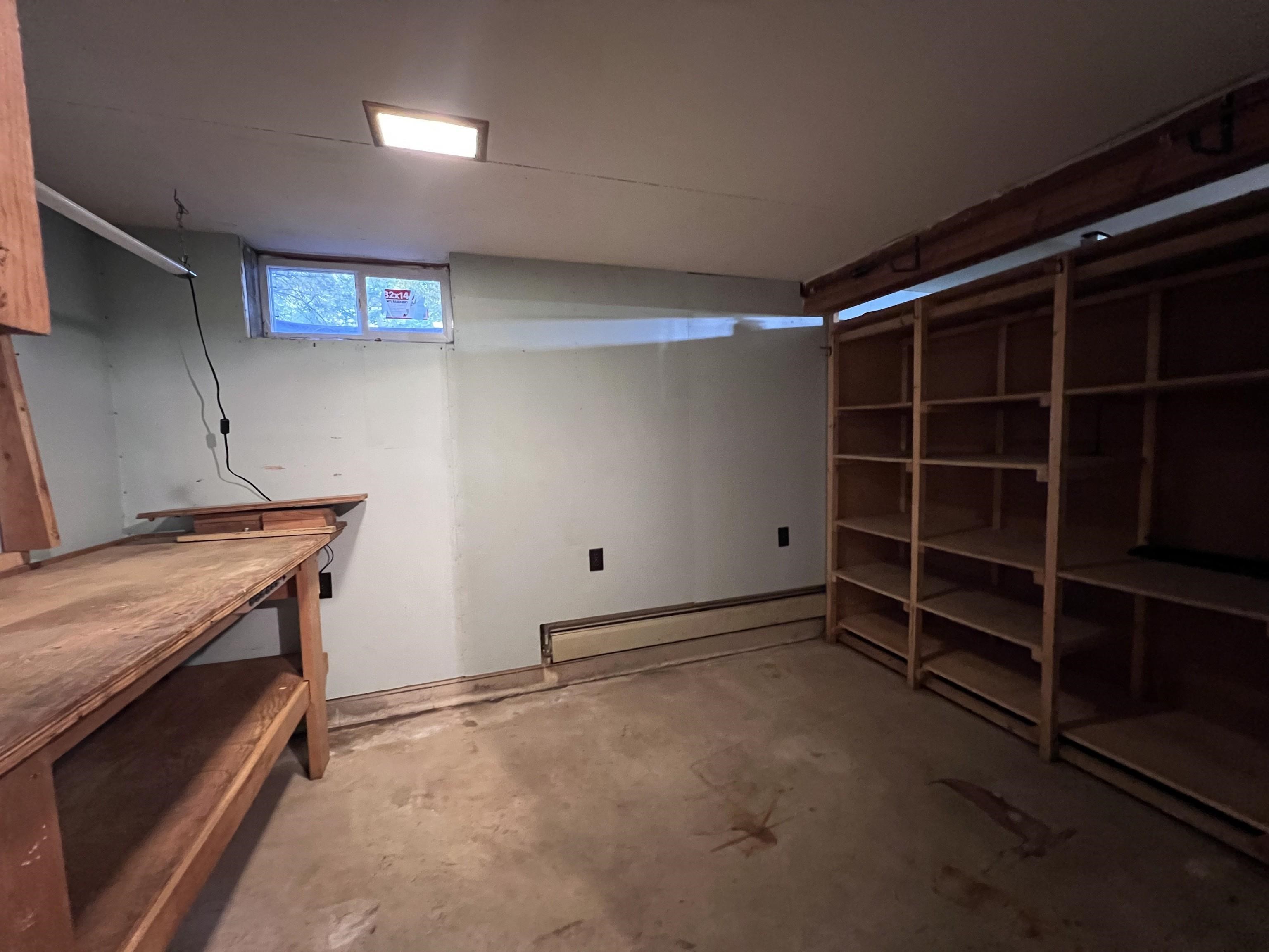 202 North 58th Street Superior, WI 54880 - Photo 20 of 30 Basement with a baseboard heating unit