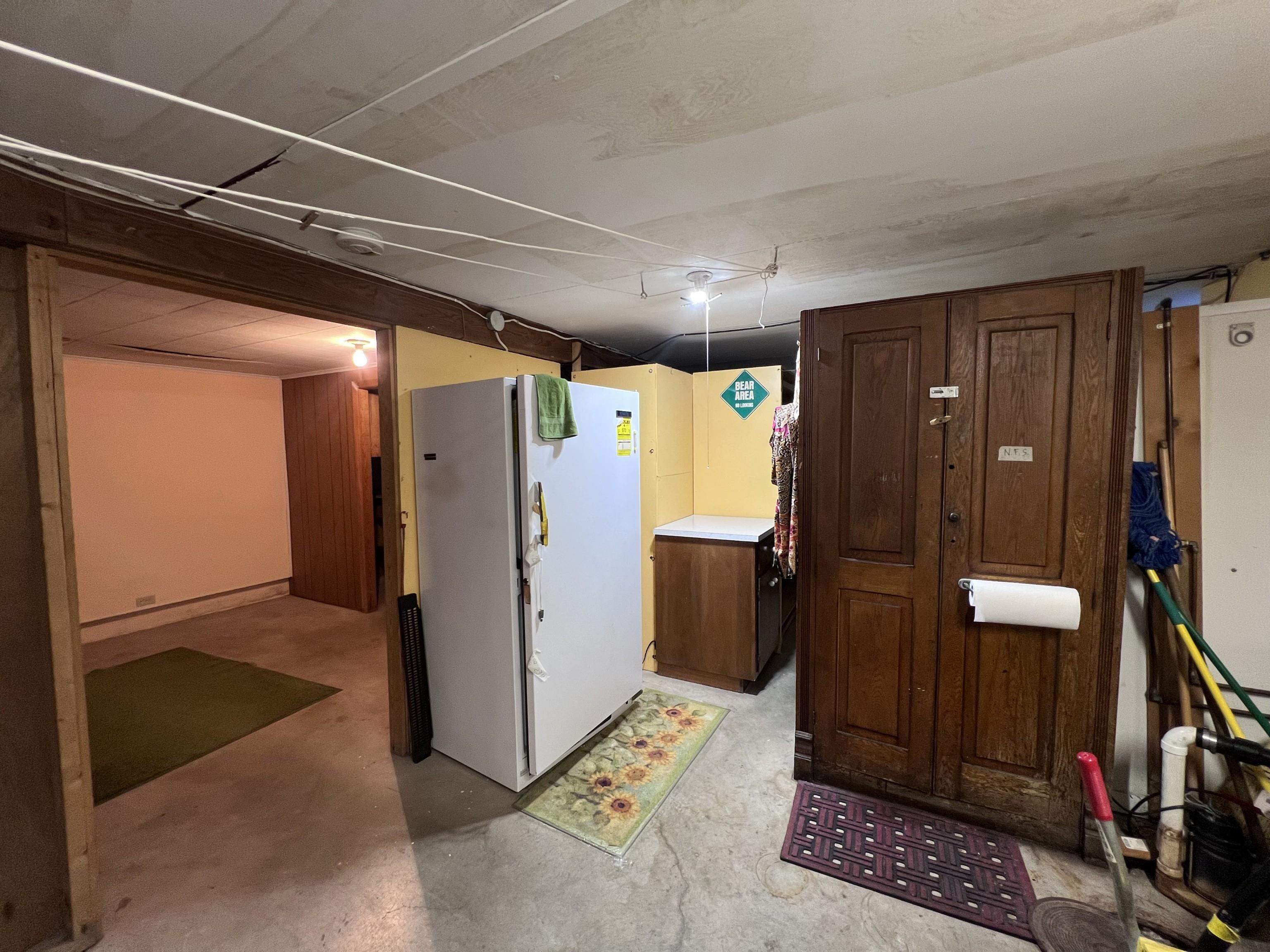 202 North 58th Street Superior, WI 54880 - Photo 24 of 30 Finished basement with freestanding refrigerator