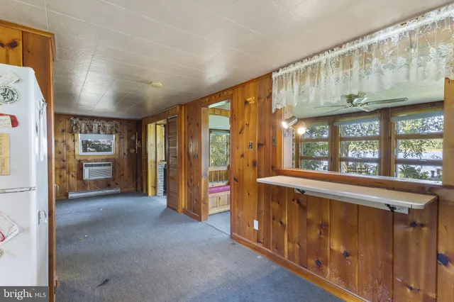 a view of an entryway with front door