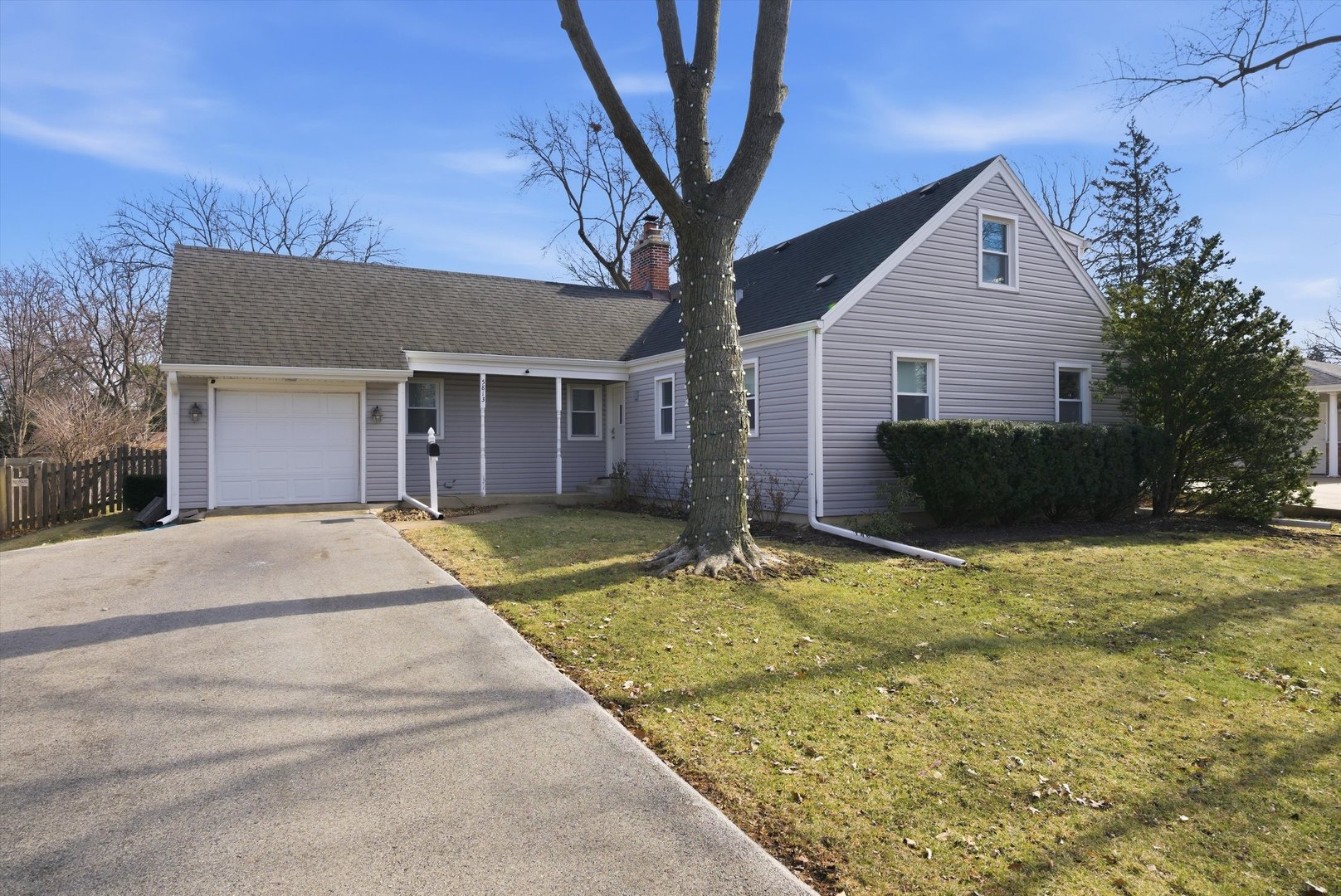 5813 Dunham Road Downers Grove, IL 60516 - Photo 1 of 6 a front view of a house with a yard
