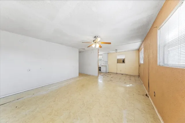 a view of a room with a window