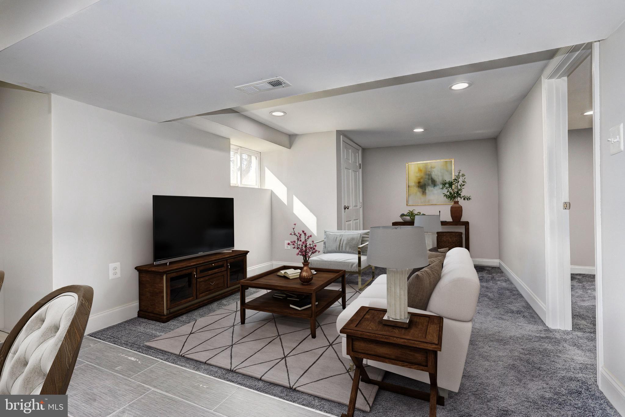 6005 Ritchie Highway Brooklyn, MD 21225 - Photo 14 of 27 Virtually Staged Family Room/Optional Guest Suite