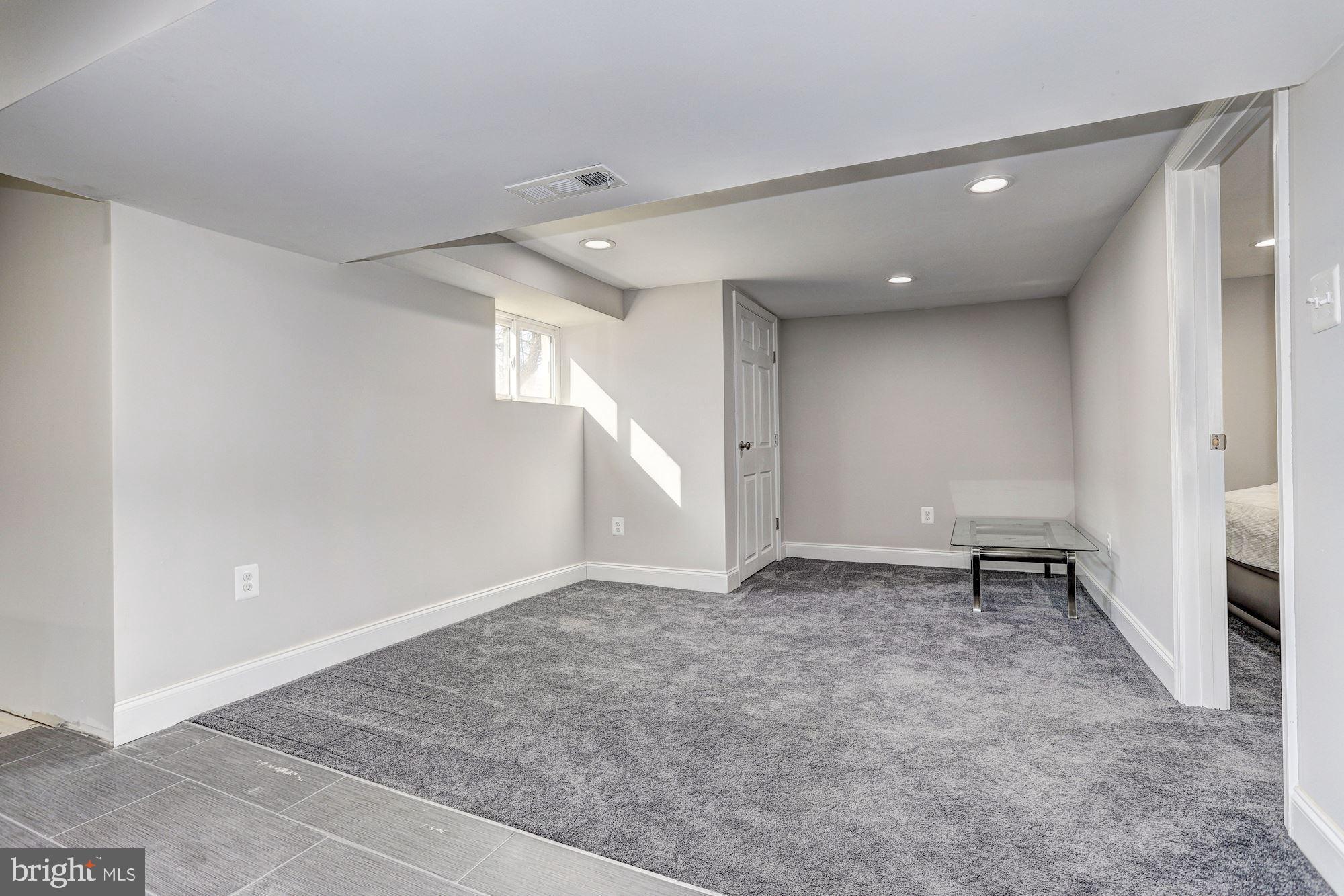 6005 Ritchie Highway Brooklyn, MD 21225 - Photo 15 of 27 Family Room/Optional Guest Suite