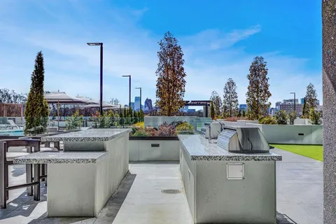 a view of a swimming pool with a table and chairs