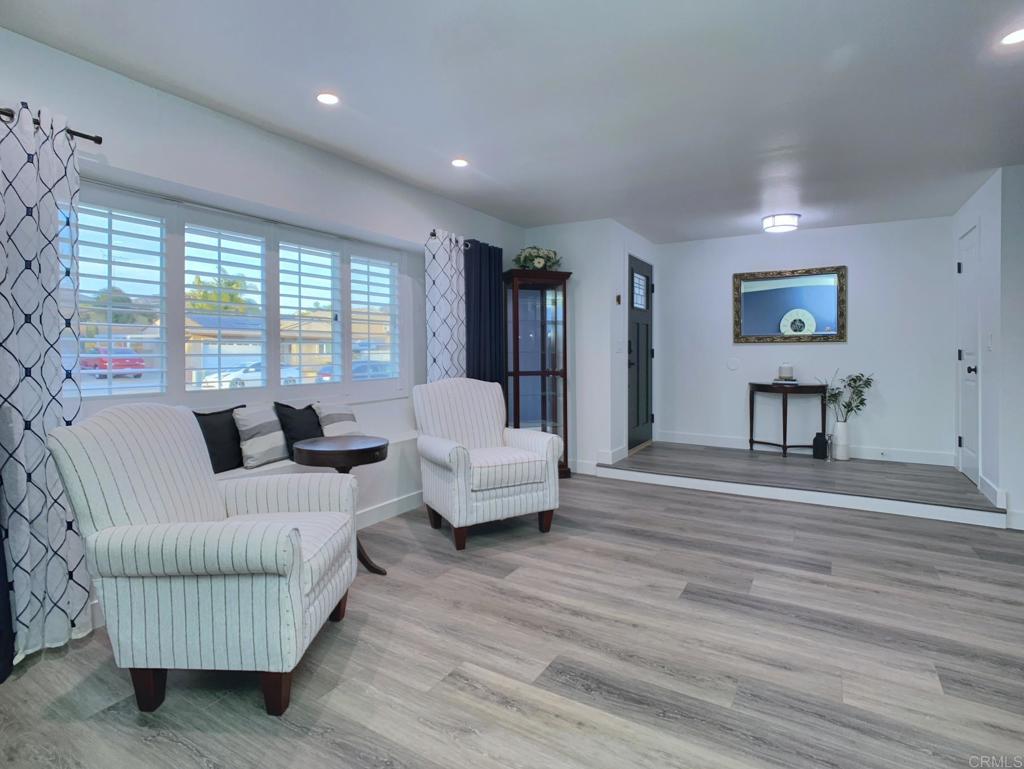 10005 3 Oaks Way Santee, CA 92071 - Photo 4 of 25 a living room with furniture and a couch