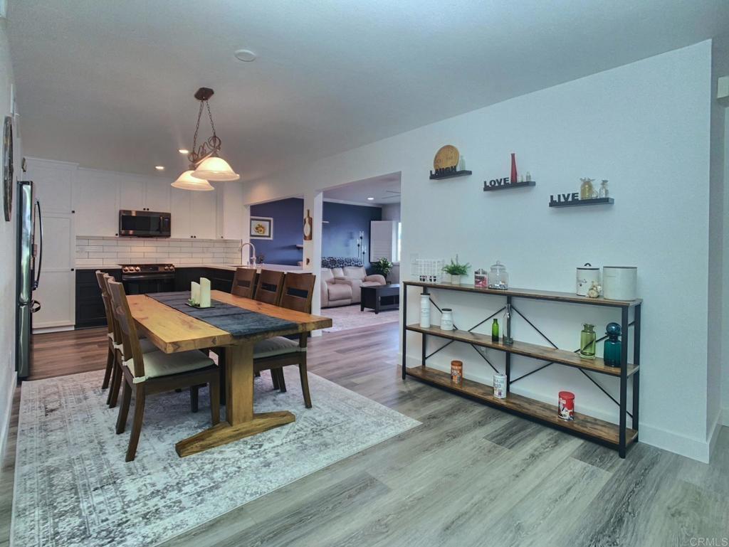 10005 3 Oaks Way Santee, CA 92071 - Photo 7 of 25 a living room with furniture and a table