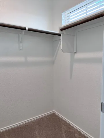 a bathroom with a sink vanity toilet and shower