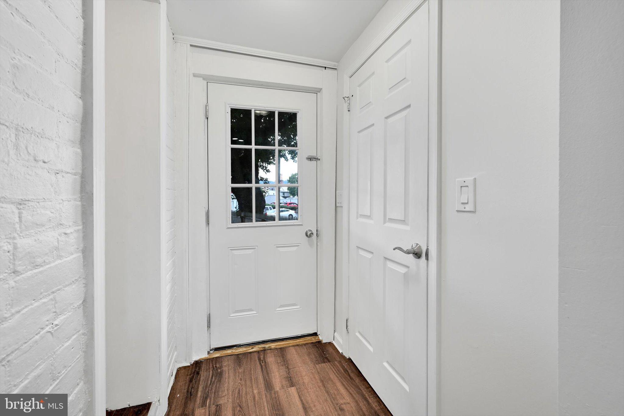 3964 Penn Avenue Sinking Spring, PA 19608 - Photo 16 of 30 a view of a hallway with wooden floor and closet