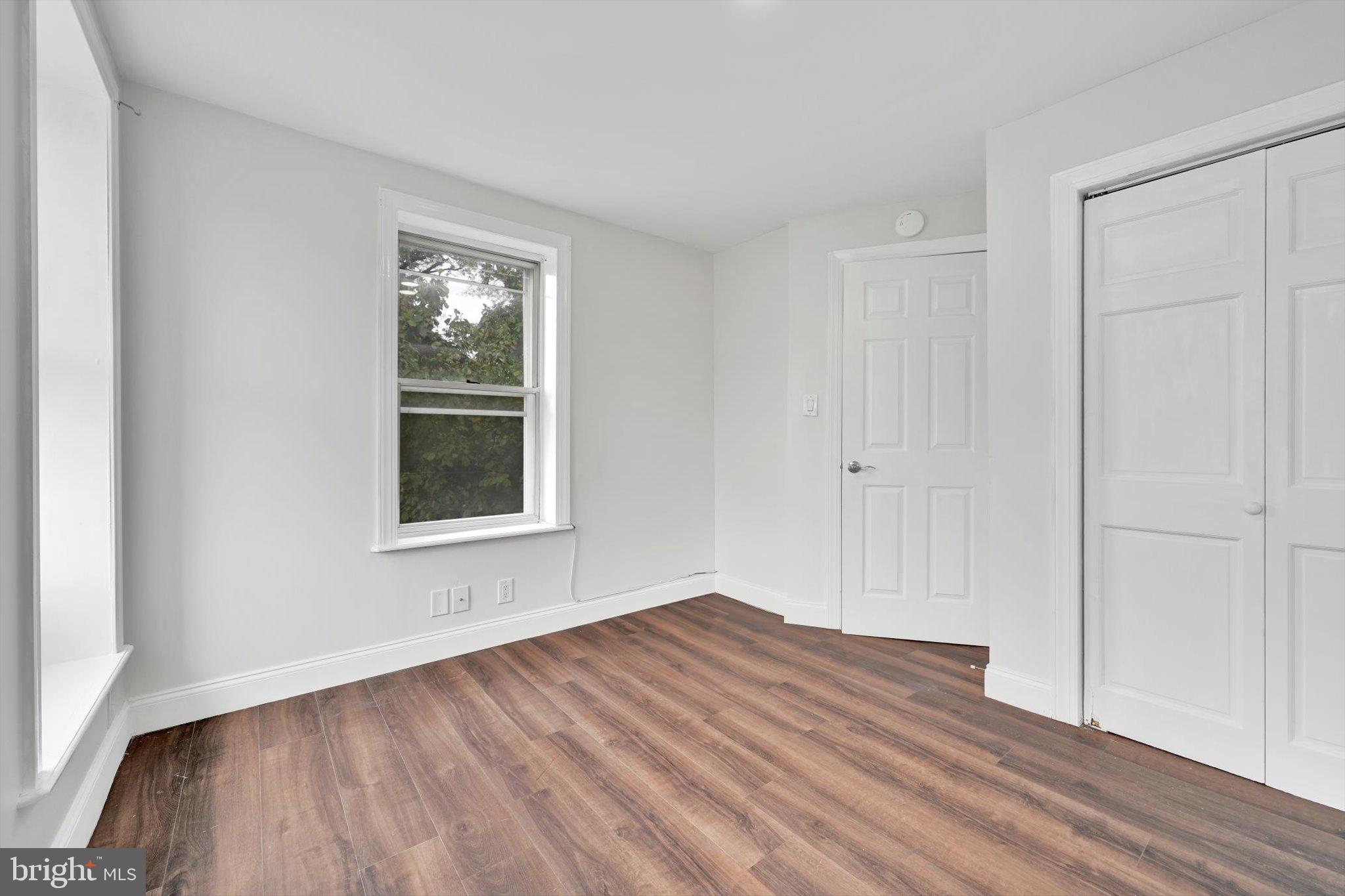 3964 Penn Avenue Sinking Spring, PA 19608 - Photo 23 of 30 a view of empty room with wooden floor and fan