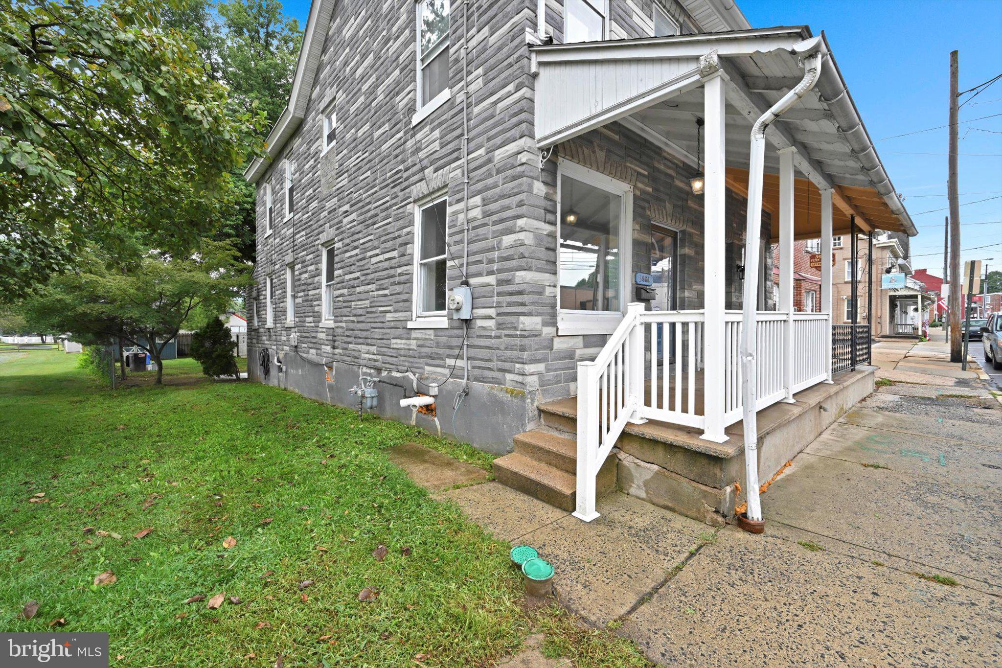 3964 Penn Avenue Sinking Spring, PA 19608 - Photo 28 of 30 a view of a chair and table in backyard of the house