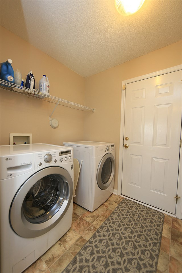 3712 Pinkham Way Raleigh, NC 27616 - Photo 9 of 18 Separate Laundry Area Just Off Kitchen and Across from Half Bath Laundry Area