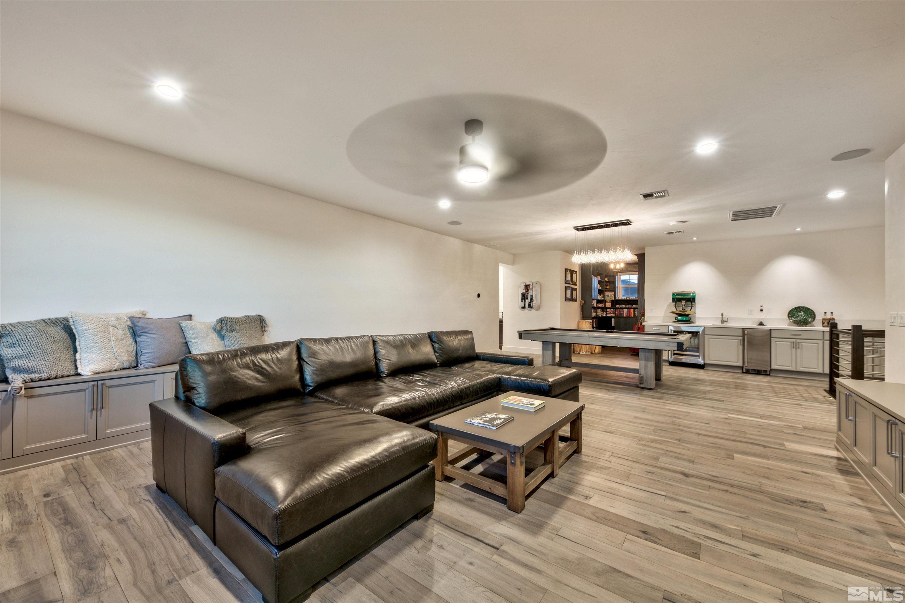 2385 Buttermere Drive Reno, NV 89521 - Photo 18 of 40 a living room with furniture and a wooden floor