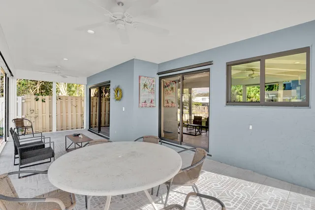 a view of a livingroom with furniture and window