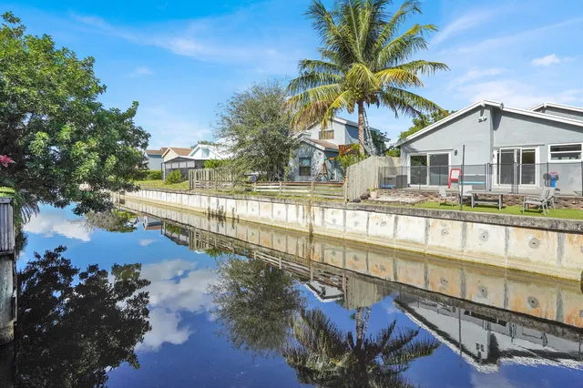 a view of a house with a swimming pool