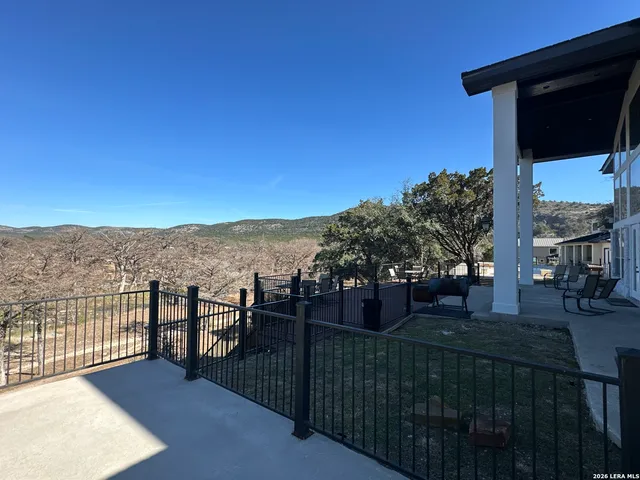 a view of a terrace with sitting area