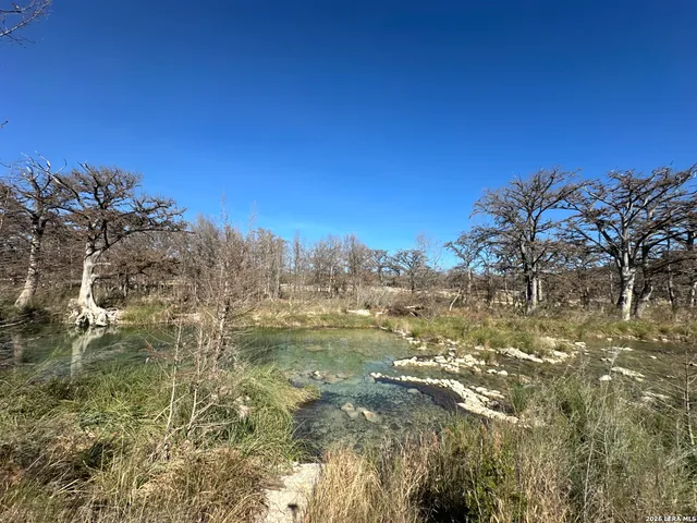 a view of a town with mountains in the background