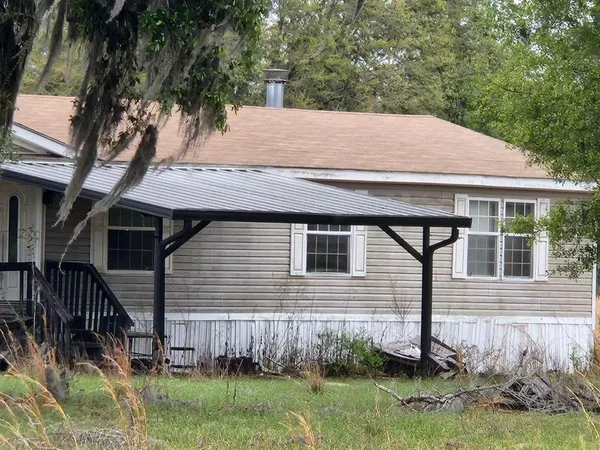 a view of backyard of house