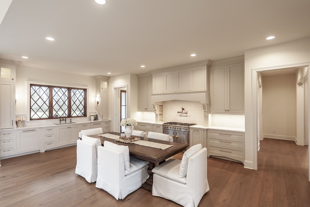 197 E Bugg Hollow Road Cottontown, TN 37048 - Photo 16 of 61 a kitchen with kitchen island a sink stove and wooden floor