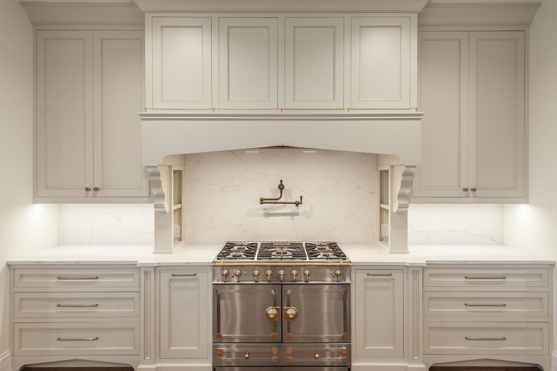 197 E Bugg Hollow Road Cottontown, TN 37048 - Photo 18 of 61 a kitchen with granite countertop white cabinets and a stove with a sink