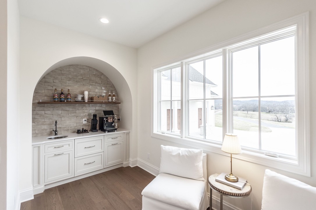 197 E Bugg Hollow Road Cottontown, TN 37048 - Photo 26 of 61 a living room with furniture and a large window