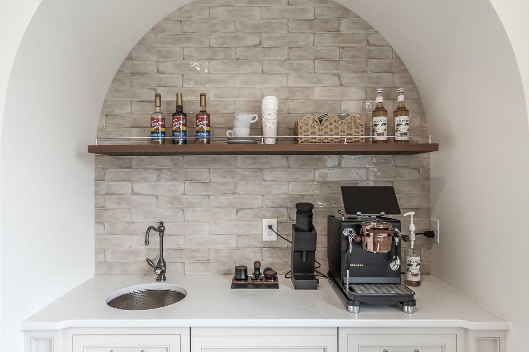 197 E Bugg Hollow Road Cottontown, TN 37048 - Photo 27 of 61 a bathroom with a sink and a stove with wooden floor