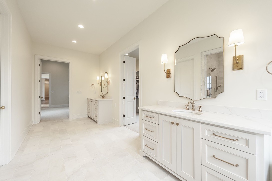 197 E Bugg Hollow Road Cottontown, TN 37048 - Photo 31 of 58 a spacious bathroom with a double vanity sink mirror and double