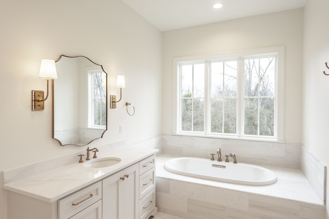 197 E Bugg Hollow Road Cottontown, TN 37048 - Photo 34 of 61 a bathroom with a double vanity sink mirror and
