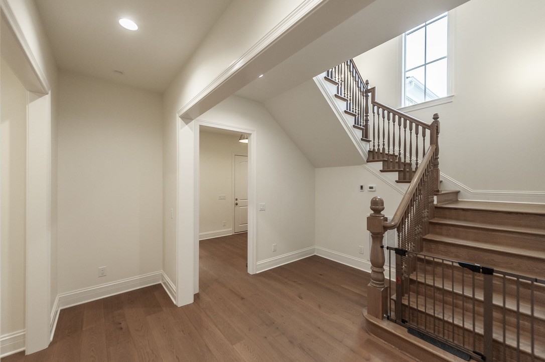 197 E Bugg Hollow Road Cottontown, TN 37048 - Photo 41 of 61 wooden floor in an empty room with a window