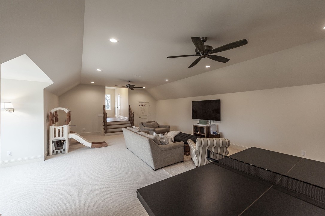 197 E Bugg Hollow Road Cottontown, TN 37048 - Photo 54 of 61 a living room with furniture and a flat screen tv