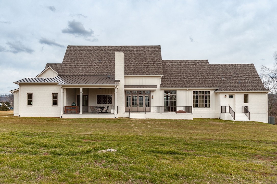 197 E Bugg Hollow Road Cottontown, TN 37048 - Photo 55 of 61 a front view of a house with a yard