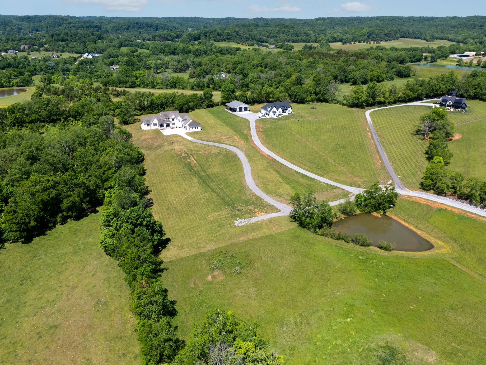 197 E Bugg Hollow Road Cottontown, TN 37048 - Photo 58 of 58 an aerial view of a house with a yard