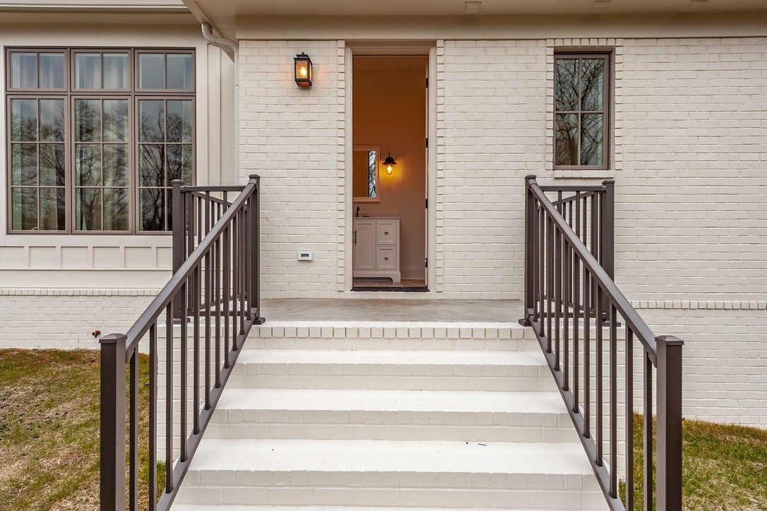 197 E Bugg Hollow Road Cottontown, TN 37048 - Photo 61 of 61 a view of staircase with railing and windows