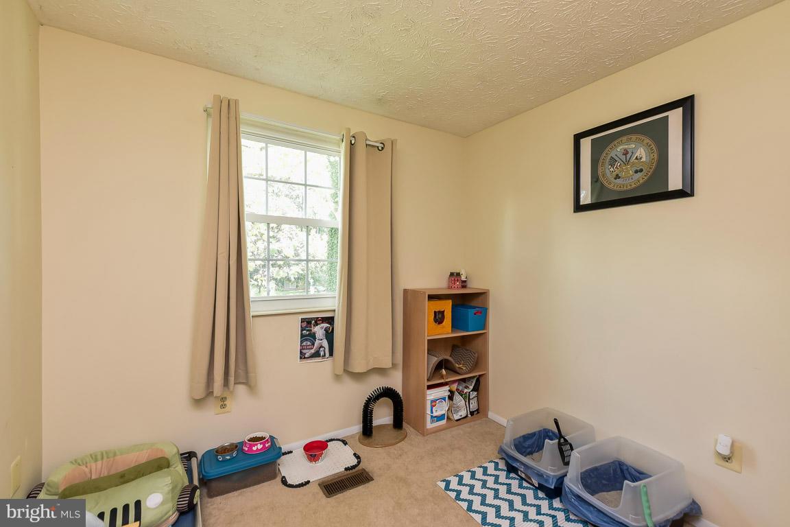 5809 Heming Avenue Springfield, VA 22151 - Photo 12 of 22 a view of room with toys and a window