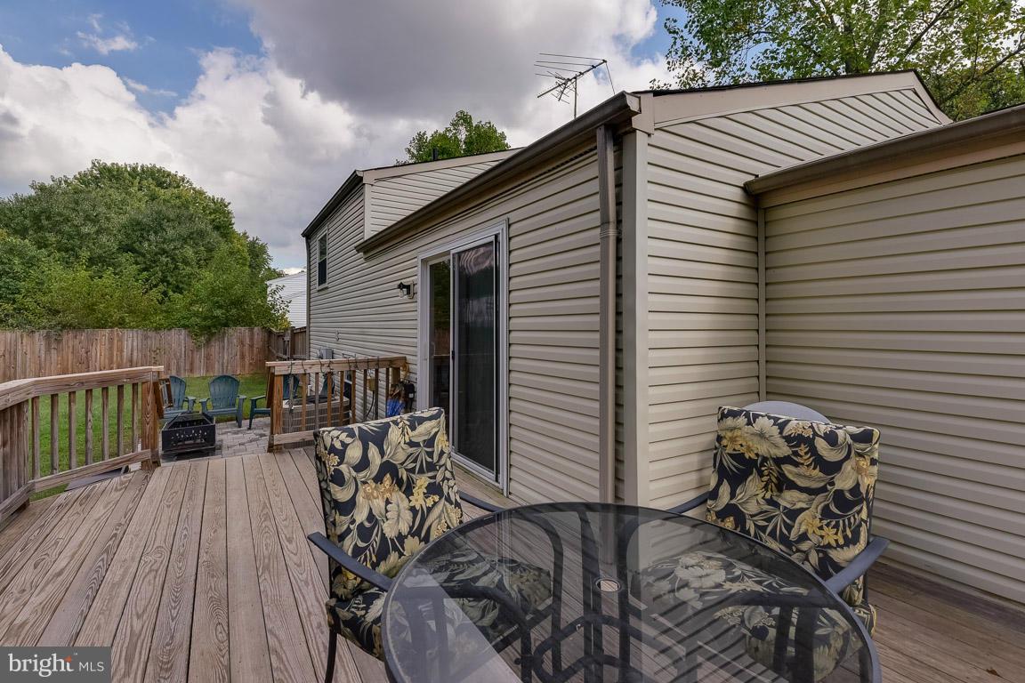 5809 Heming Avenue Springfield, VA 22151 - Photo 18 of 22 a view of deck with patio