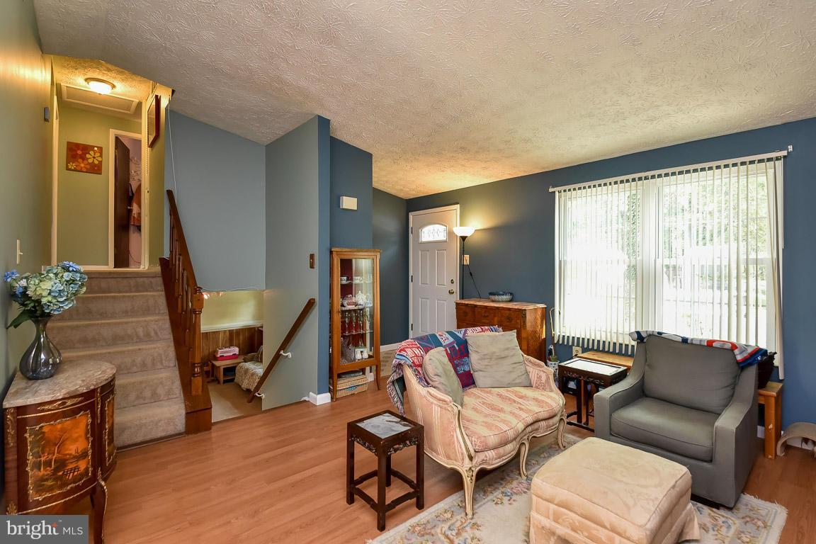 5809 Heming Avenue Springfield, VA 22151 - Photo 3 of 22 a living room with furniture and a window