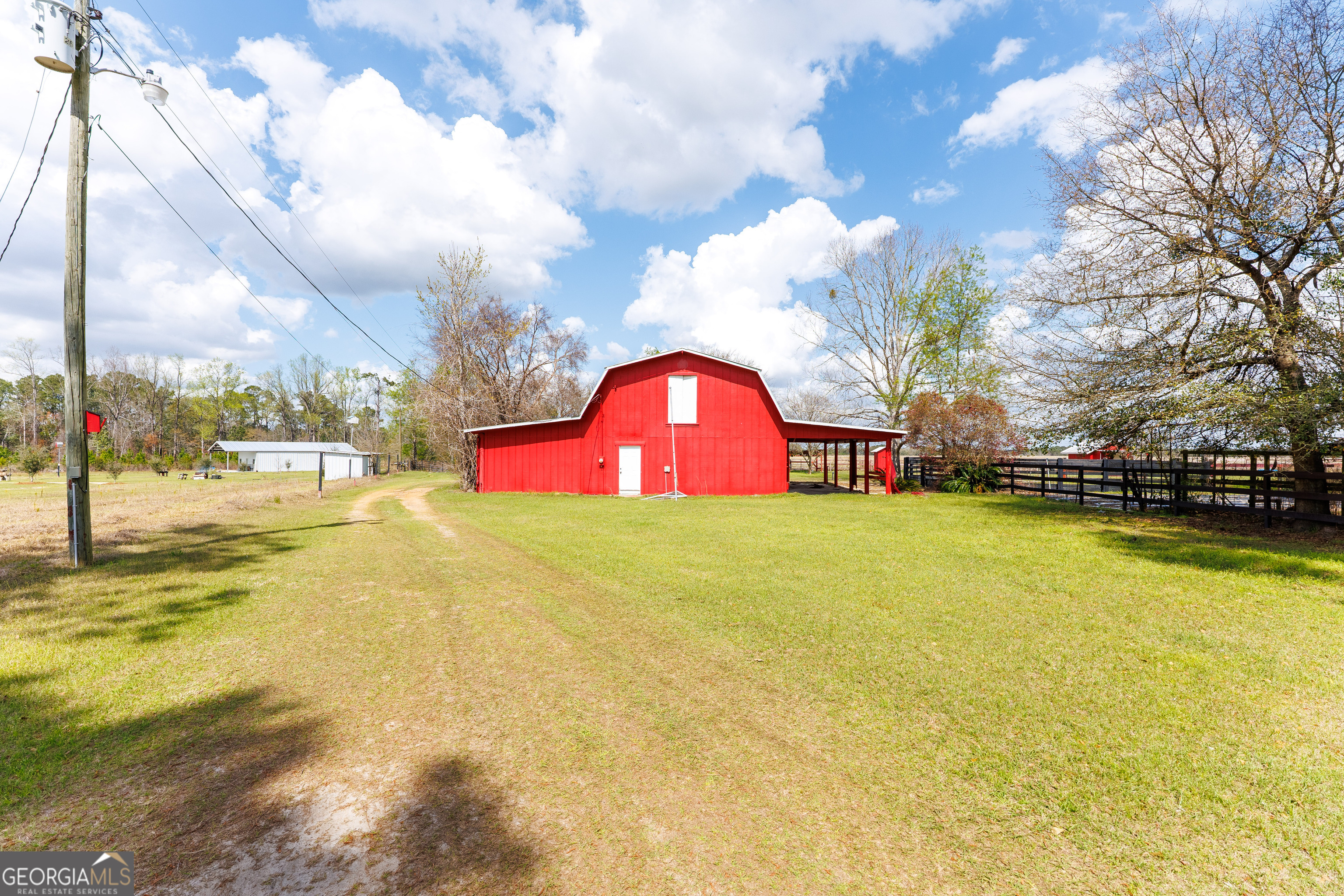 1121 Futch Road Adel, GA 31620 - Photo 2 of 28 a view of swimming pool with outdoor seating