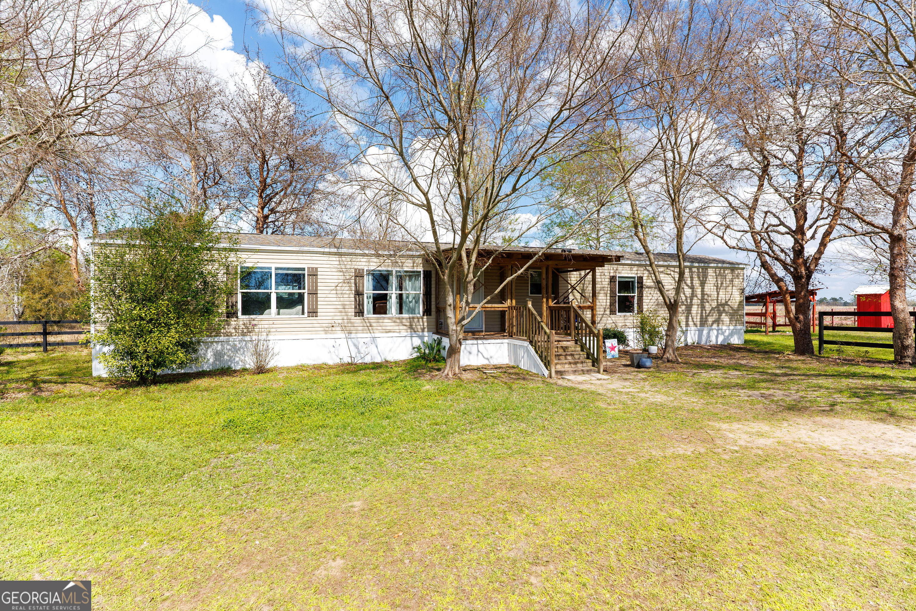 1121 Futch Road Adel, GA 31620 - Photo 4 of 28 a view of a house with swimming pool