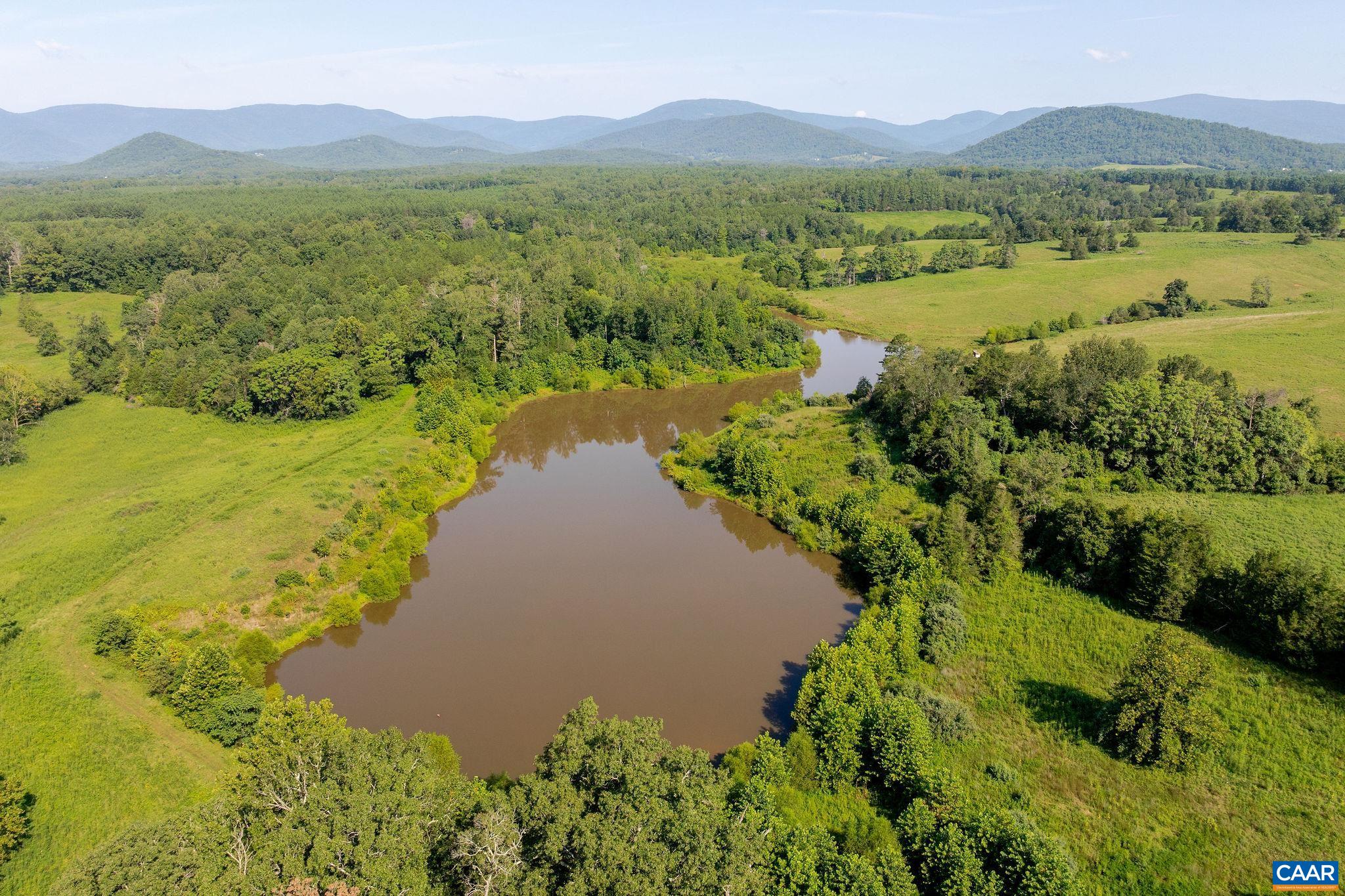 955 Simmons Gap Road Dyke, VA 22935 - Photo 12 of 33 a view of lake with mountain