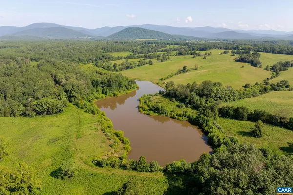 a view of a lake with a mountain