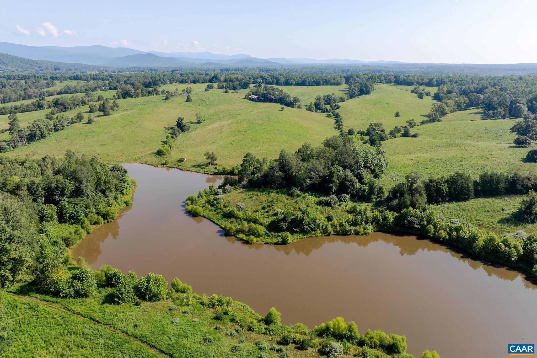 955 Simmons Gap Road Dyke, VA 22935 - Photo 16 of 33 an aerial view of a city with lake view