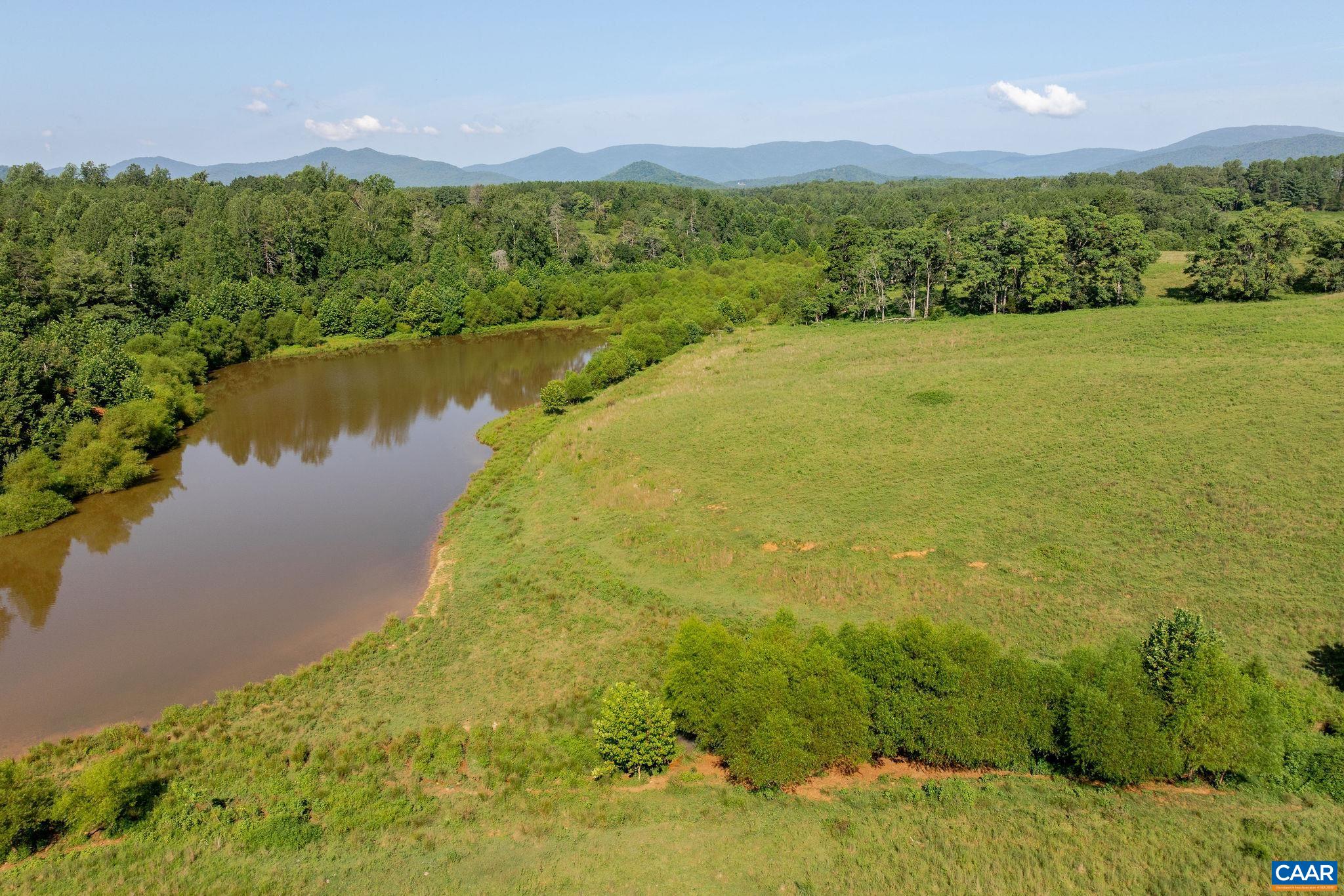 955 Simmons Gap Road Dyke, VA 22935 - Photo 19 of 33 a view of a lake with a city