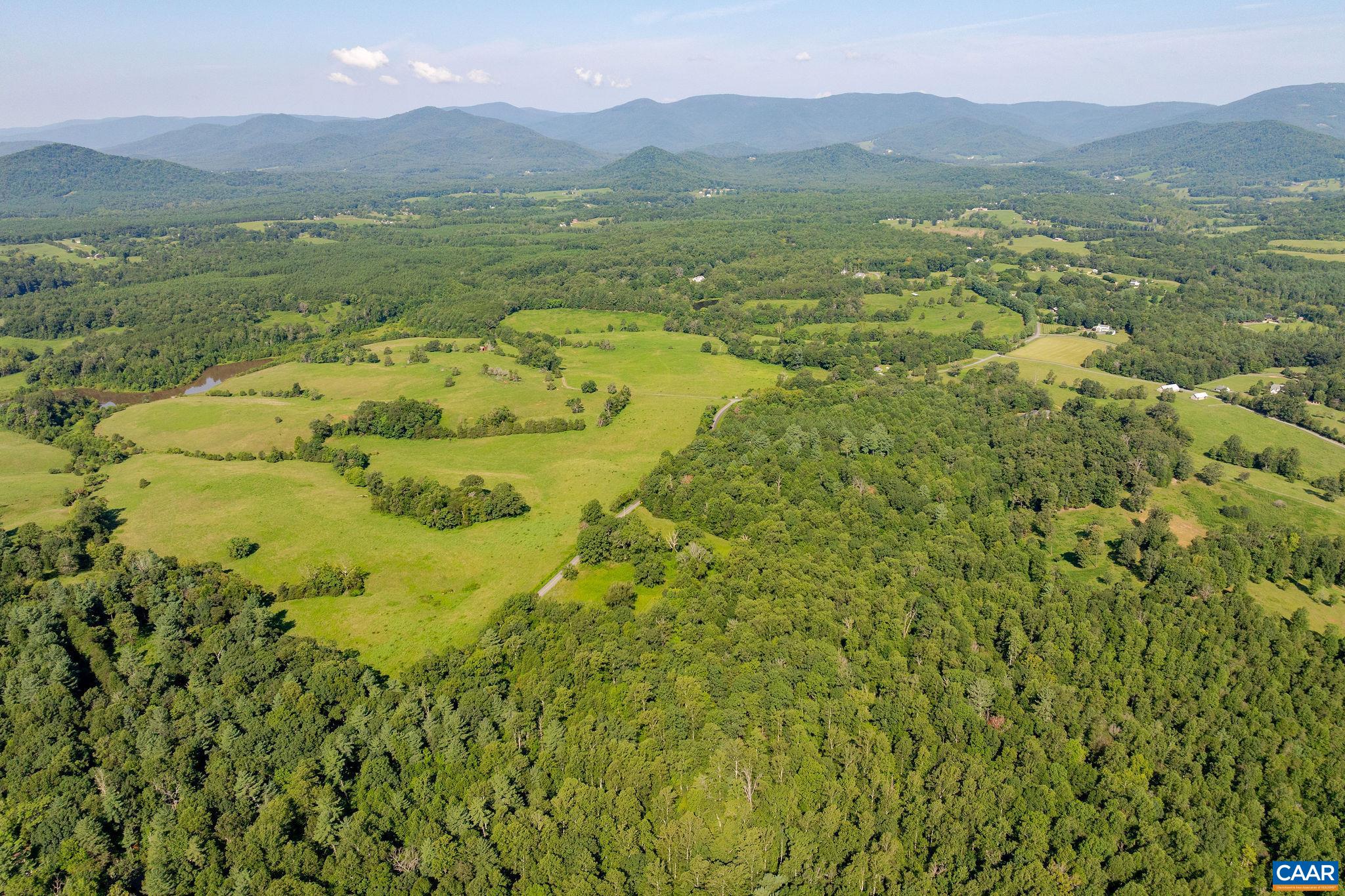 955 Simmons Gap Road Dyke, VA 22935 - Photo 2 of 33 a view of lake with mountain